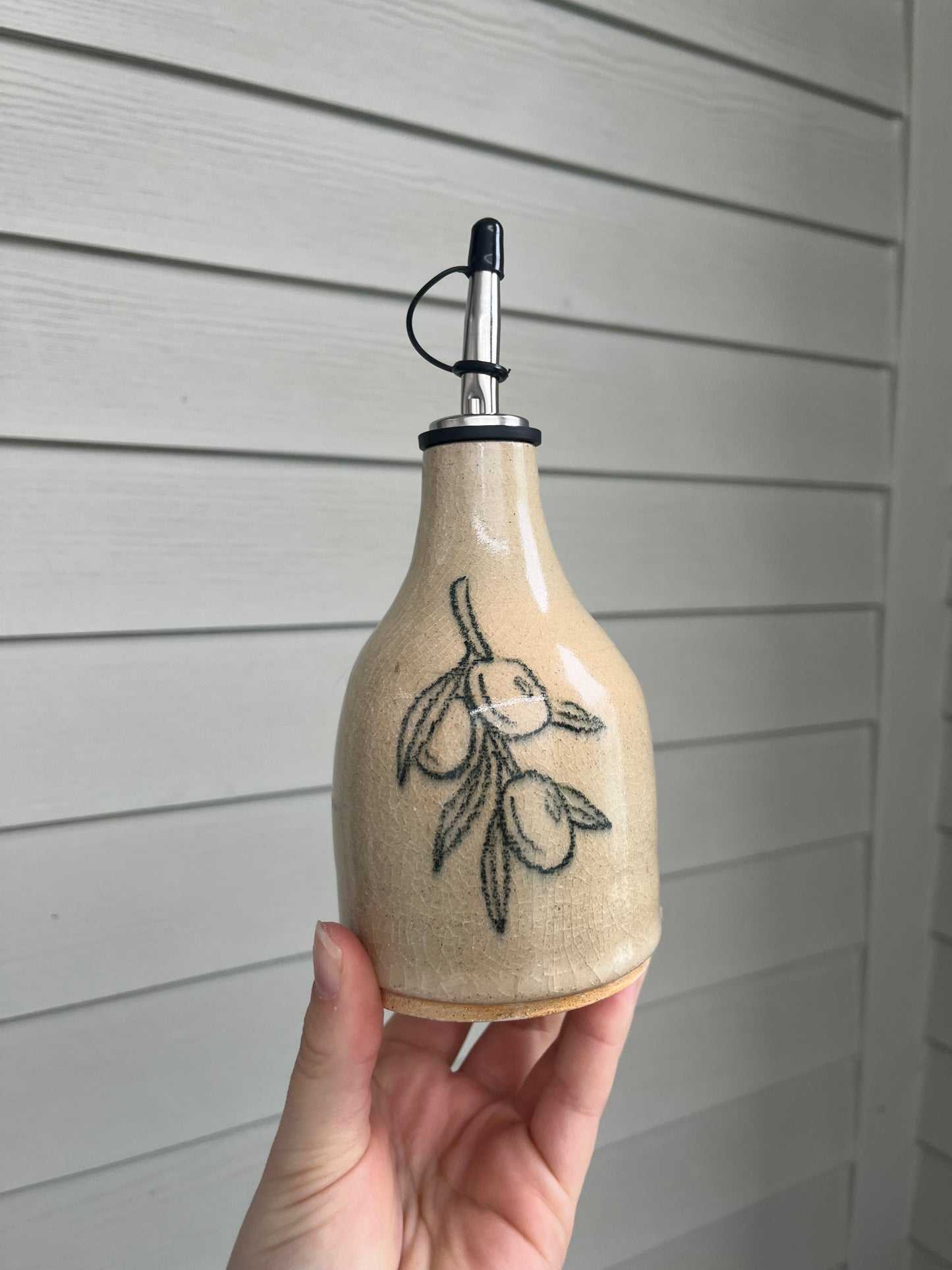 olive branch oil bottle