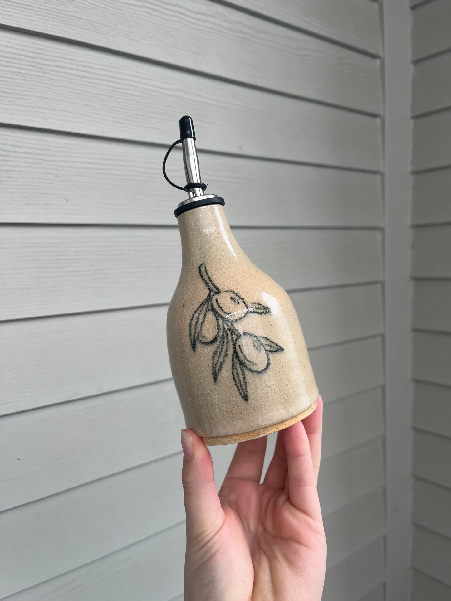 olive branch oil bottle