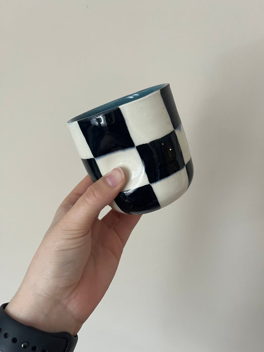 black checkered thumb cup B